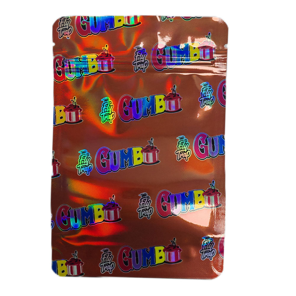 Mylar bag 7g, herb Mylar Bags, Where to buy mylar bags, Custom mylar bags near me, Mylar Bags Wholesale. Foil wrapper with 'Gumbo' and 'Filly Trap' branding on a white background