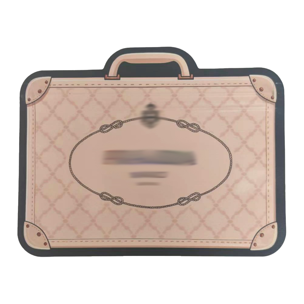 Mylar Bags Quilted suitcase-shaped mat with a handle on a white background