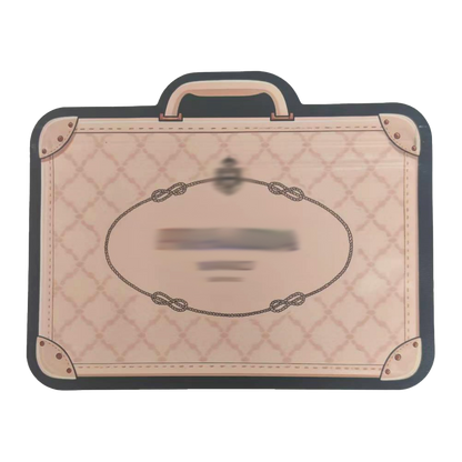Mylar Bags Quilted suitcase-shaped mat with a handle on a white background