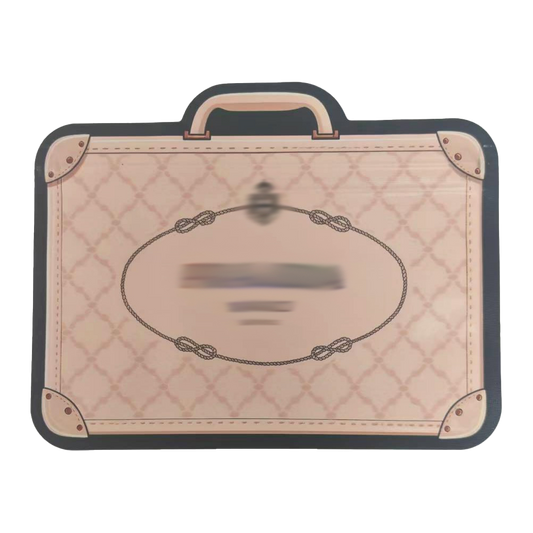Mylar Bags Quilted suitcase-shaped mat with a handle on a white background
